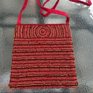 Vibrant Red Textured Crossbody Bag with Geometric Stripes